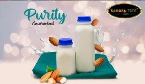 Milk bottles with almonds and splashes.