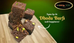 Dhoda Burfi pieces on wooden surface.